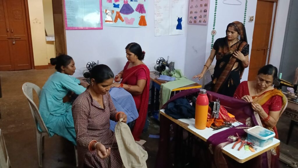 trainees engaged in tailoring